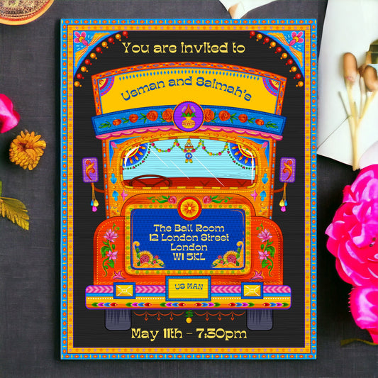 a colorful bus birthday party card on a table