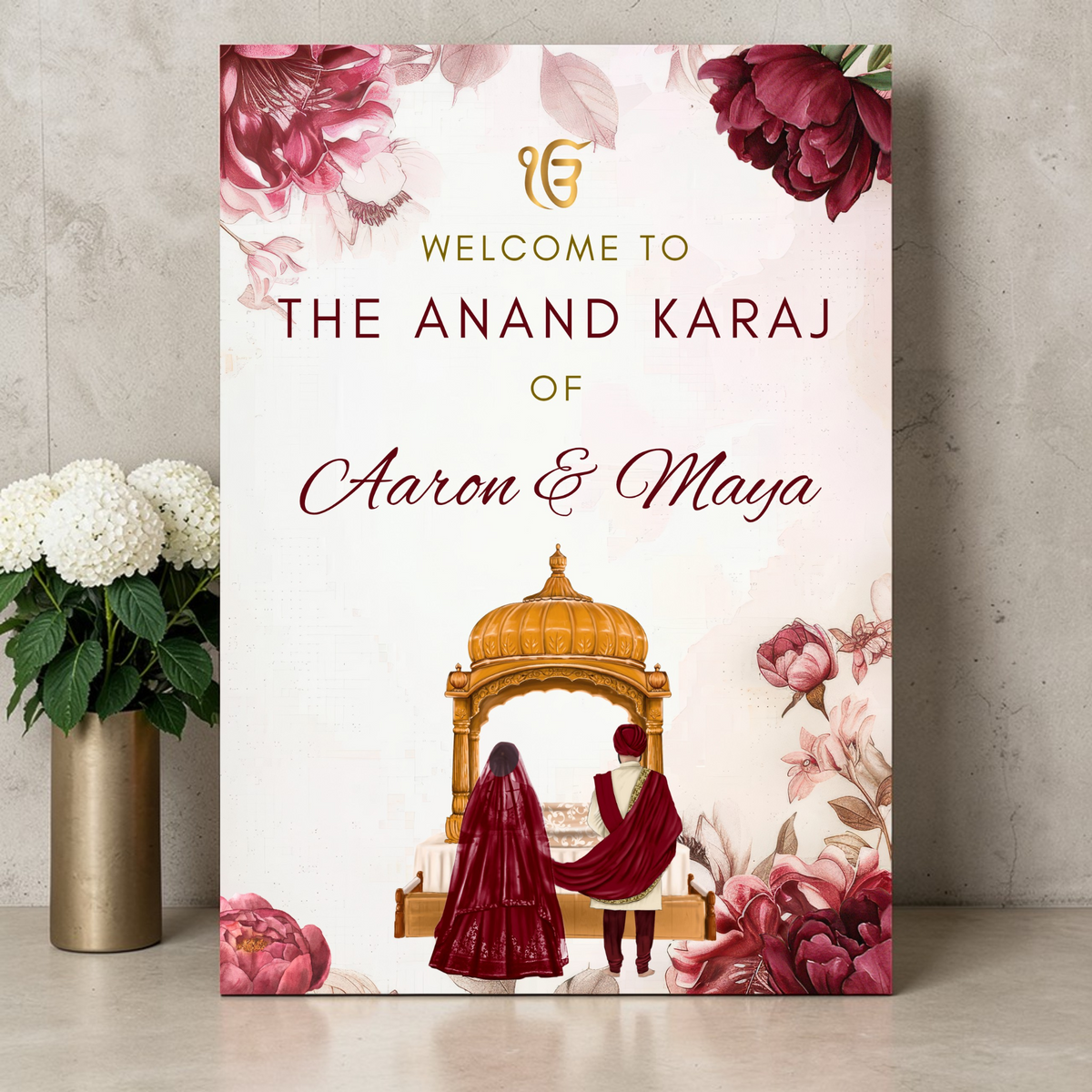 Personalised Anand Karaj Sikh wedding welcome sign with gold Ik Onkar Gurdwara dome couple and burgundy peony florals on foamex board