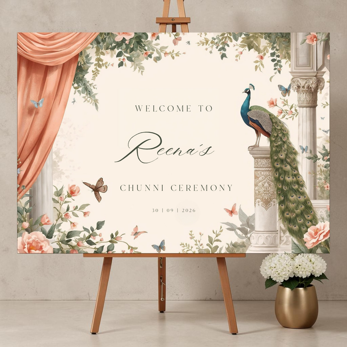 Personalised Chunni Ceremony welcome sign printed on 3mm foamex board, peacock and floral design with peach drape, displayed on black easel, A1 size