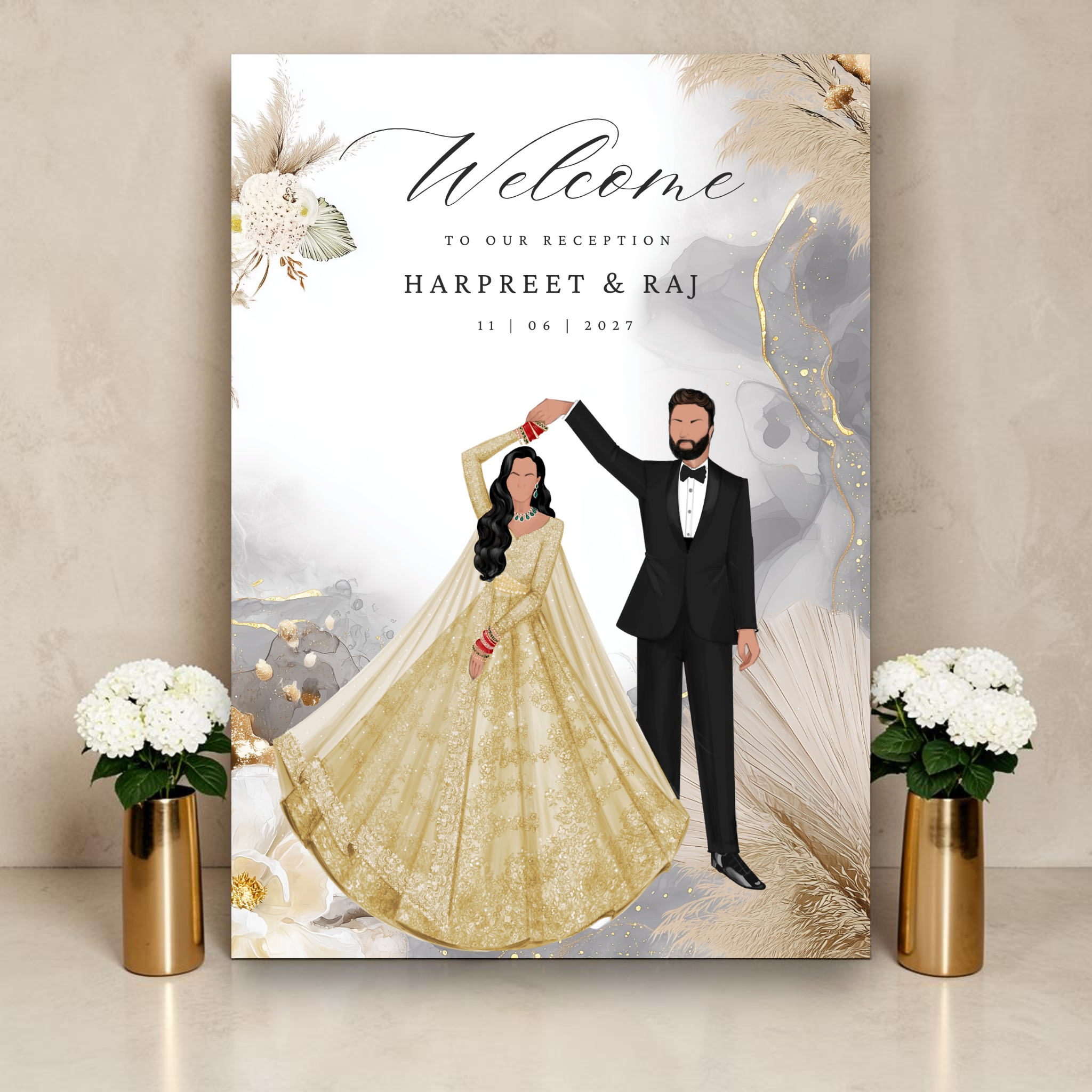 Indian wedding reception welcome sign on a gold easel beside white hydrangeas, featuring an illustrated bride in a sweeping gold lehenga being spun by a groom in a black tuxedo on a moody grey watercolour and gold ink backdrop with pampas grass and white magnolias, personalised with names Harpreet and Raj and date 11 06 2027