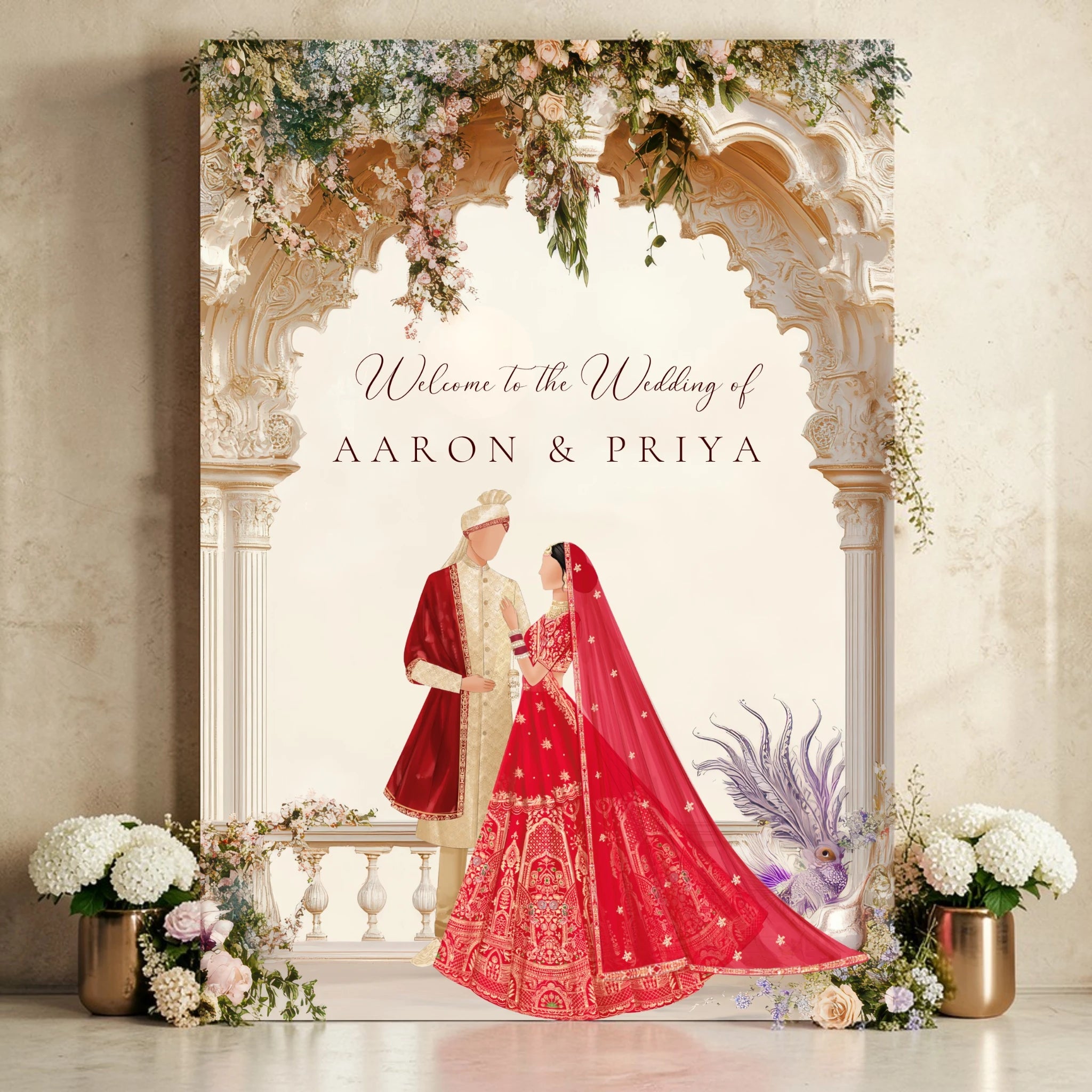 Personalised Indian wedding welcome sign printed on 3mm foamex displayed on silver easel in hotel ballroom, featuring illustrated bride in red lehenga and groom under white Mughal arch with cascading florals