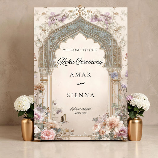 Personalised Roka ceremony welcome sign on 3mm foamex featuring ornate vintage teal and gold Mughal arch with blush cream peonies lavender wildflowers and butterfly detail with couple names in bold serif and script fonts on cream background