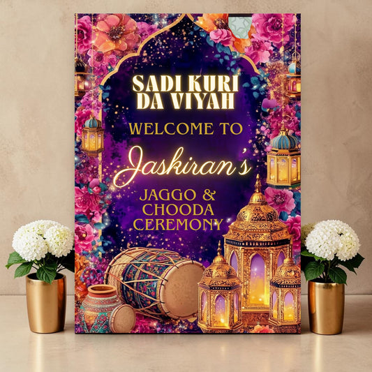 Personalised Jaggo and Chooda ceremony welcome sign printed on 3mm foamex. Deep purple background with gold Mughal arch, glowing gold lanterns, dhol drum, jewelled pot, vibrant pink and orange florals. Sadi Kuri Da Viyah text with custom bride's name in gold script. A1 or A2. By Krafty Kaur.