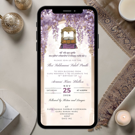 Phone displaying a sikh sukhmani sahib invitation with an elegant and modern purple floral design on a decorative table.