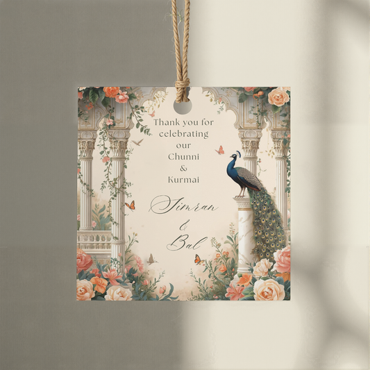 Chunni Kurmai gift box sticker with peacock marble arch coral roses and butterflies on rose gold wrapped gift box — editable Canva template any square size