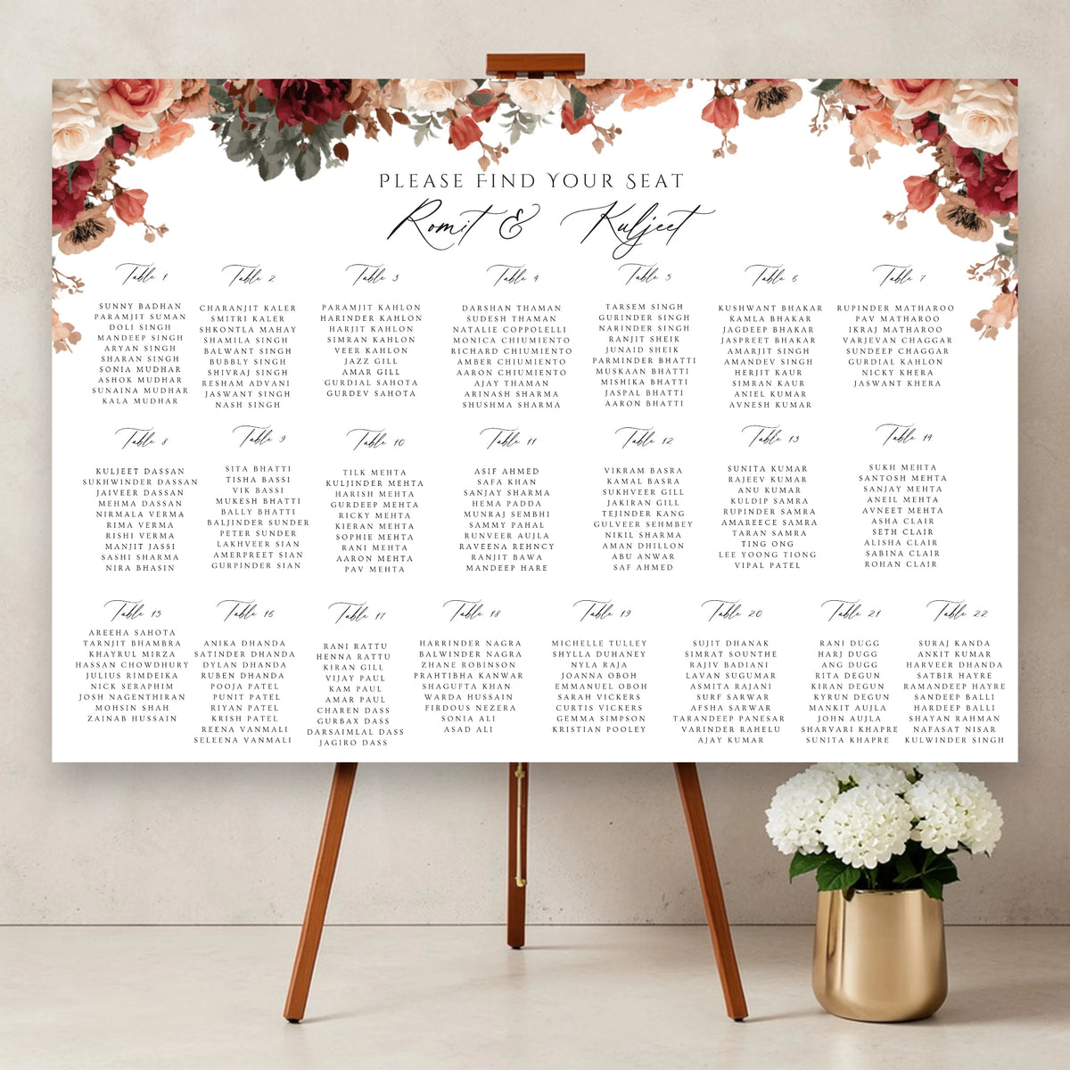 floral Indian wedding seating plan board with romantic peach and burgundy flowers personalised Asian wedding table plan